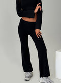 front view of model wearing Princess Polly Try Me Knit Pants Black Low Rise Pants 