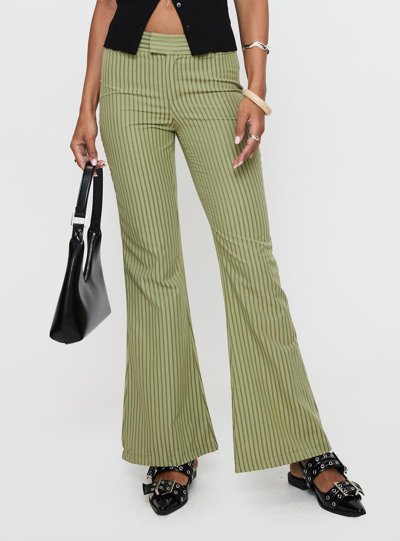 side view of model wearing Princess Polly Jinxed Pant Green Stripe 