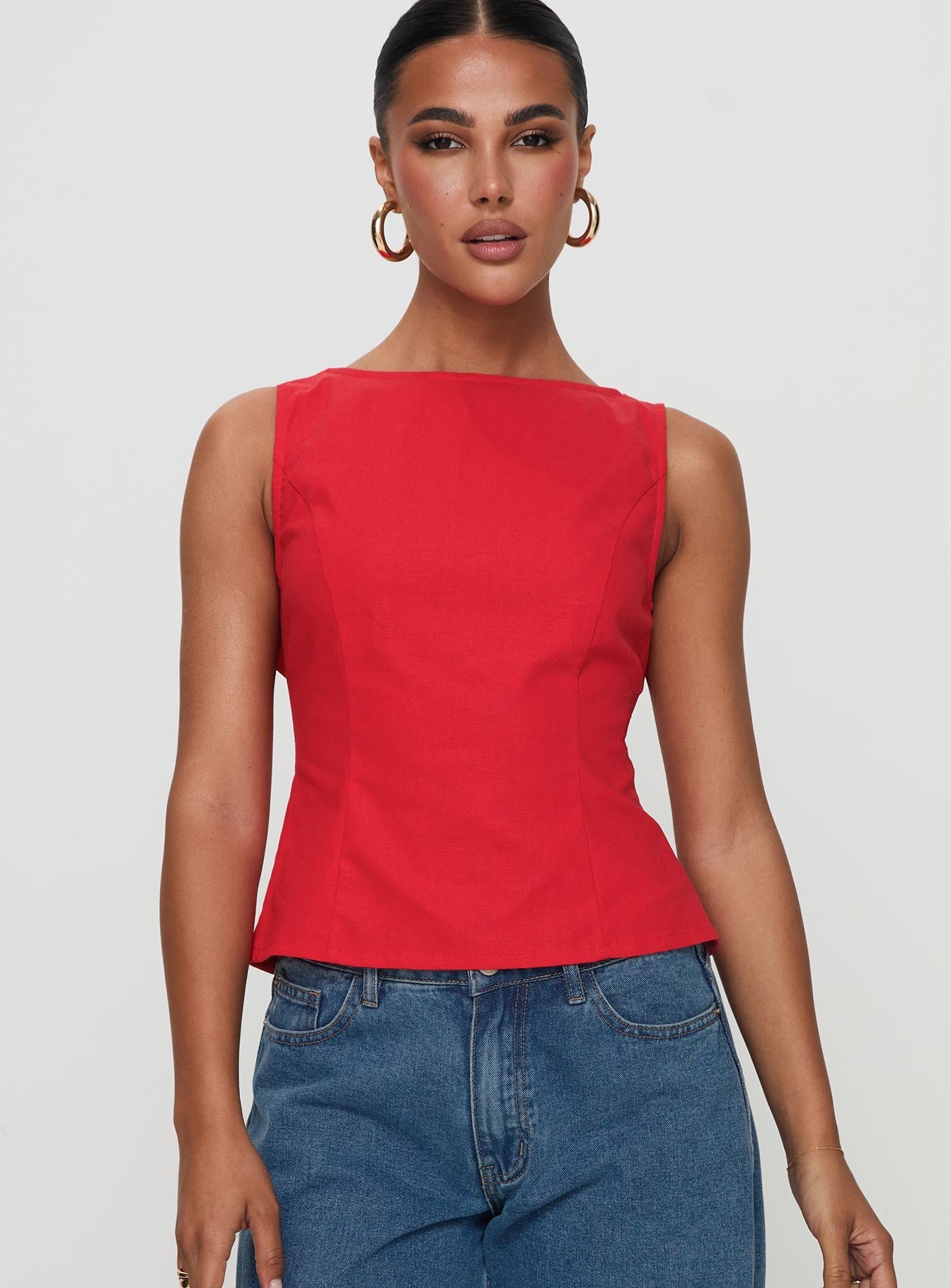 front view of model wearing Princess Polly Lilitina Top Red Sleeveless High Neck