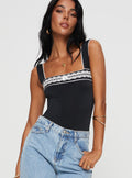 side view of model wearing Princess Polly Keating Bodysuit Black Sleeveless