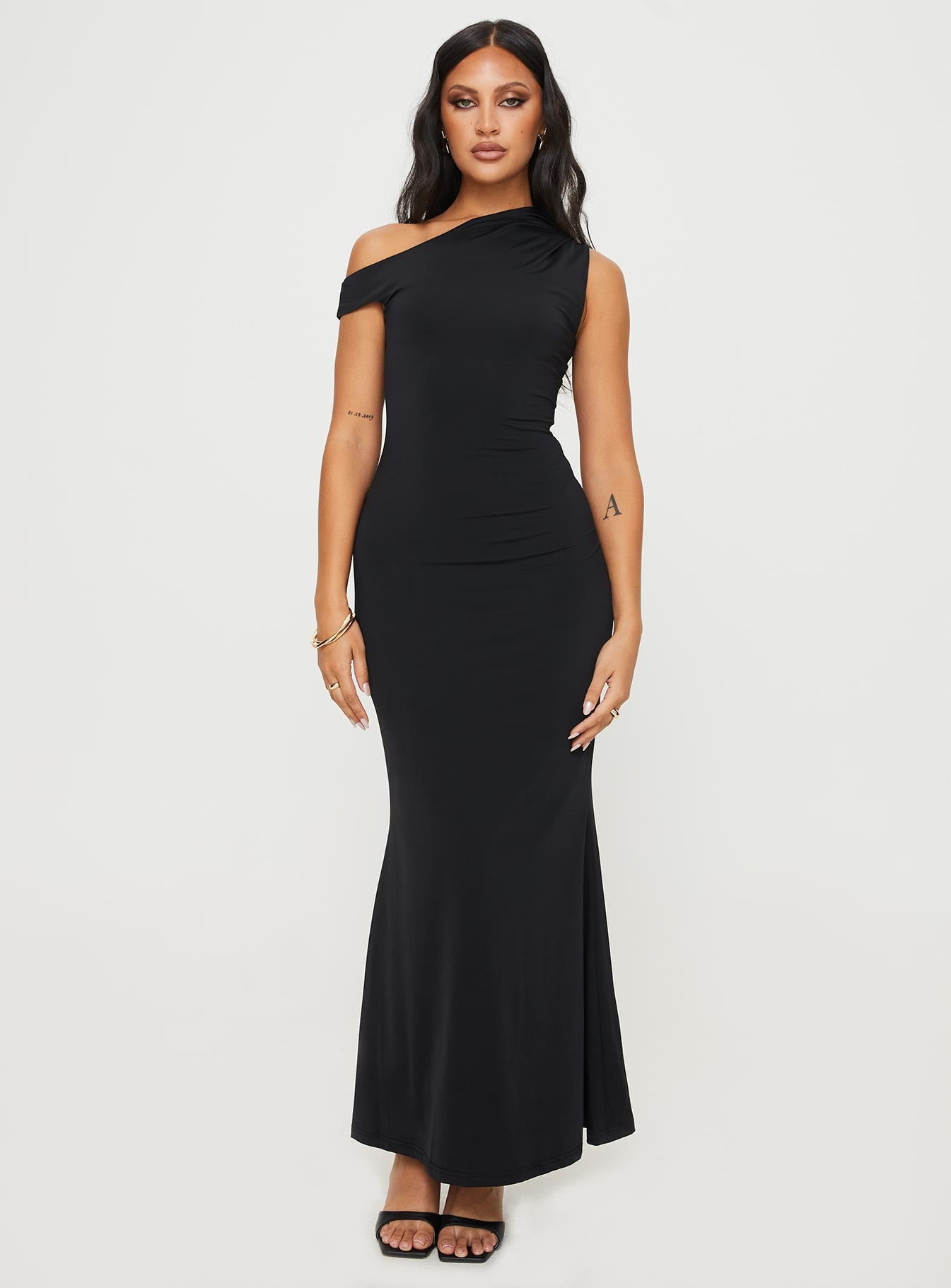 front view of model wearing Princess Polly Beller Maxi Dress Black Asymmetric Neckline