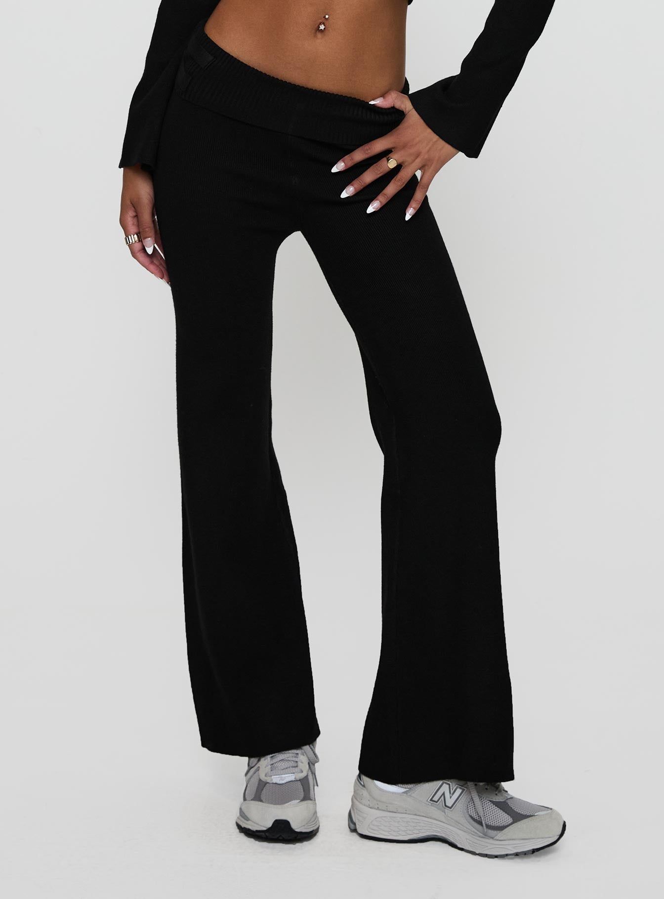 side view of model wearing Princess Polly Try Me Knit Pants Black Low Rise Pants 