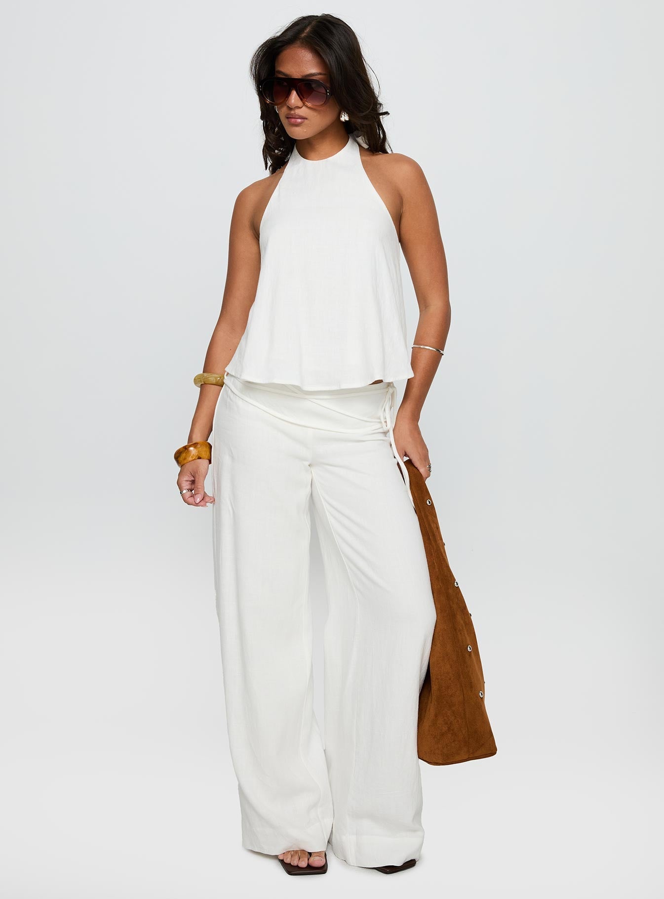 back view of model wearing Princess Polly Aquaria Halter Linen Blend Top White Sleeveless Crew Neck 
