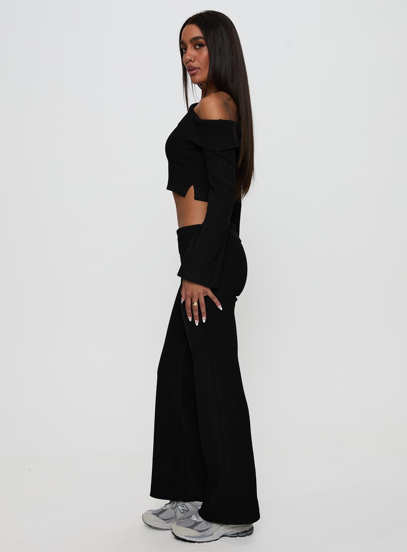 side view of model wearing Princess Polly Try Me Knit Pants Black Low Rise Pants 