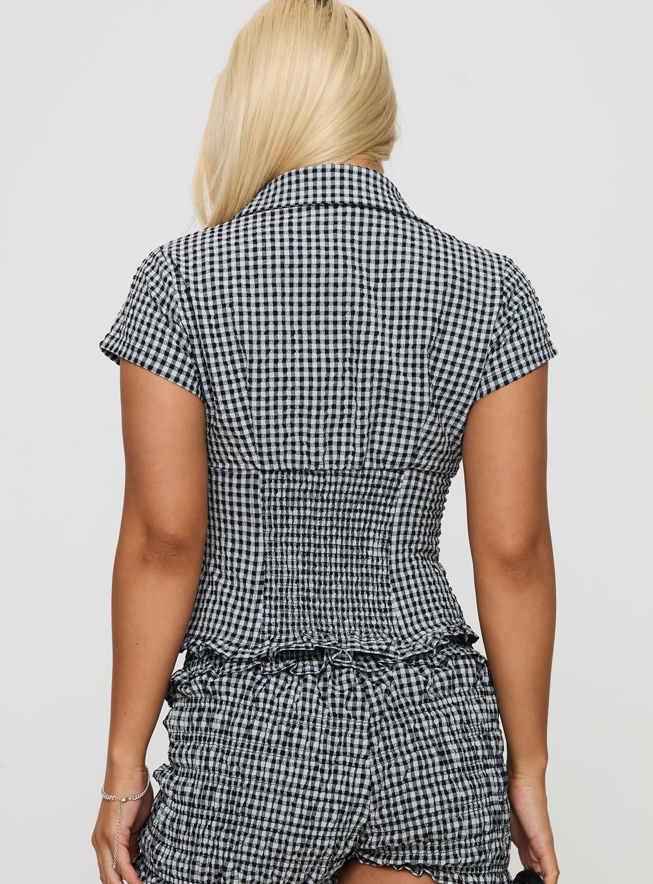 back view of model wearing Princess Polly Covey Shirred Puff Sleeve Top Multi Short Sleeves High Neck 